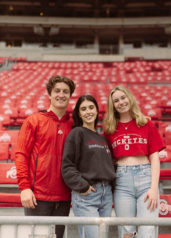 3 students in The Shoe on OSU's campus