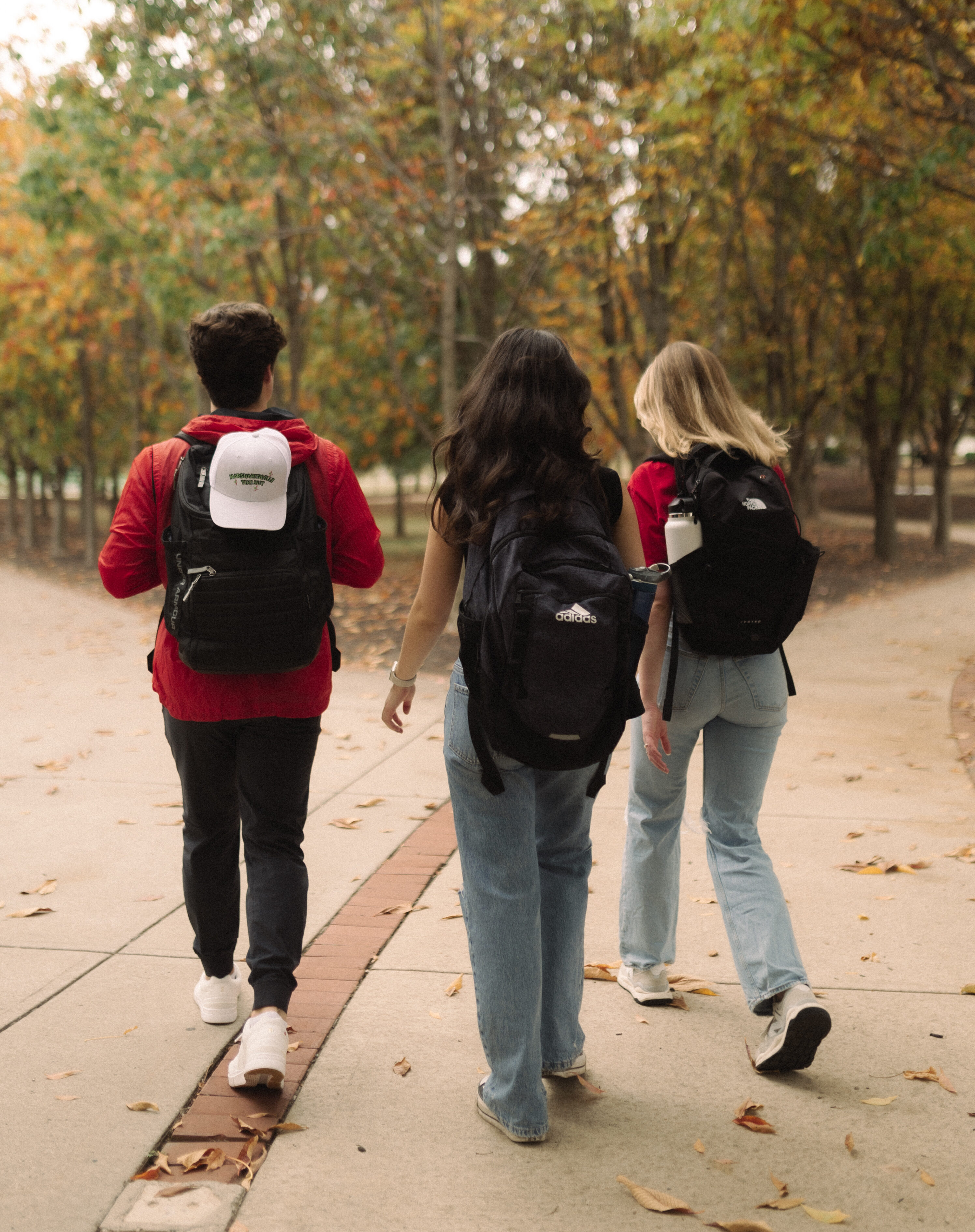 3 students walking on campus at OSU in Columbus