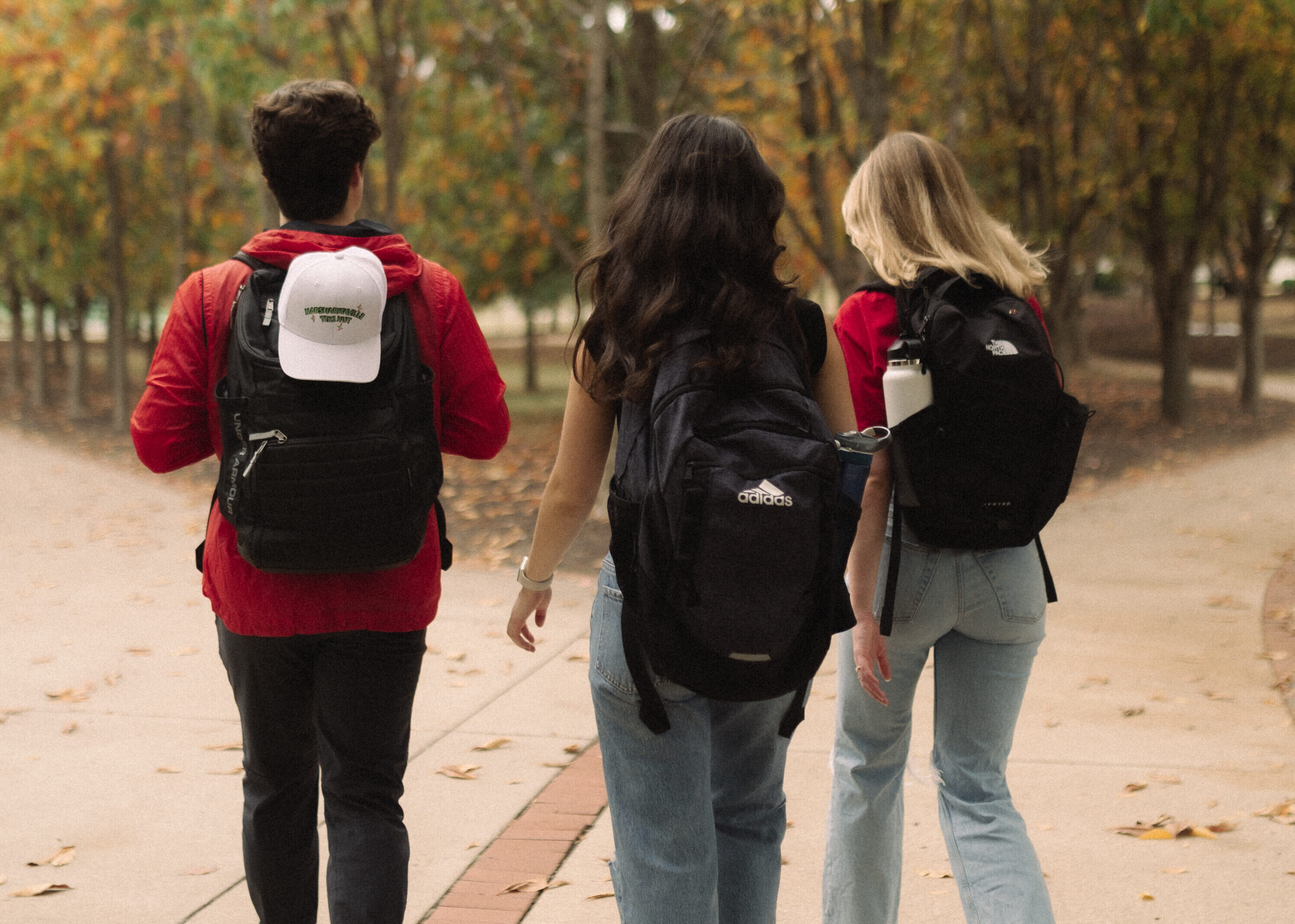 3 students walking on campus at OSU in Columbus