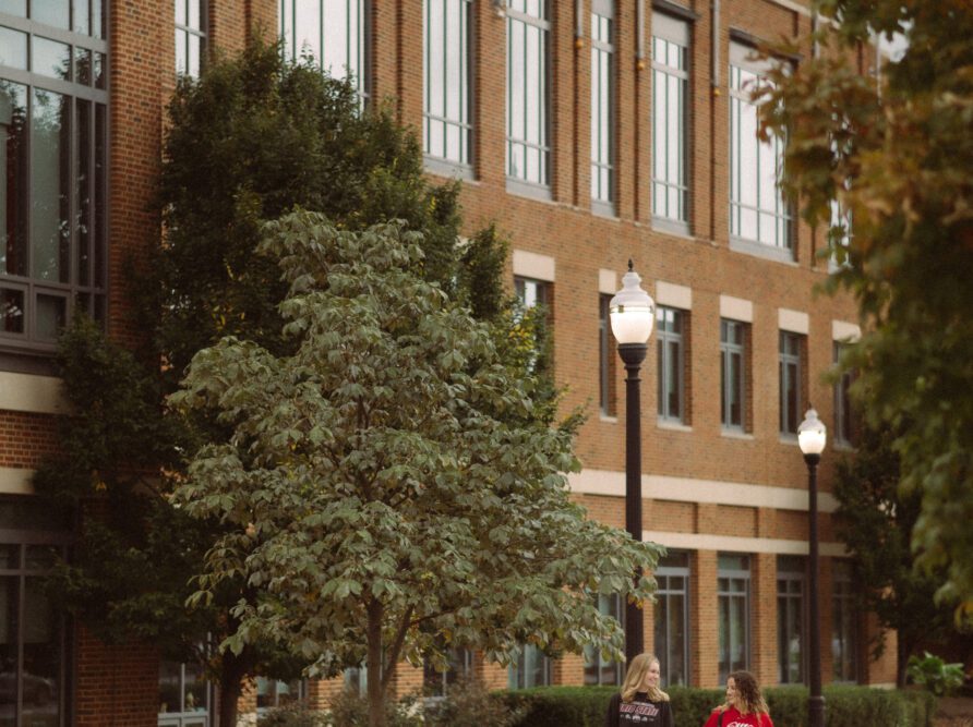 two girls walking outside the Ohio Union