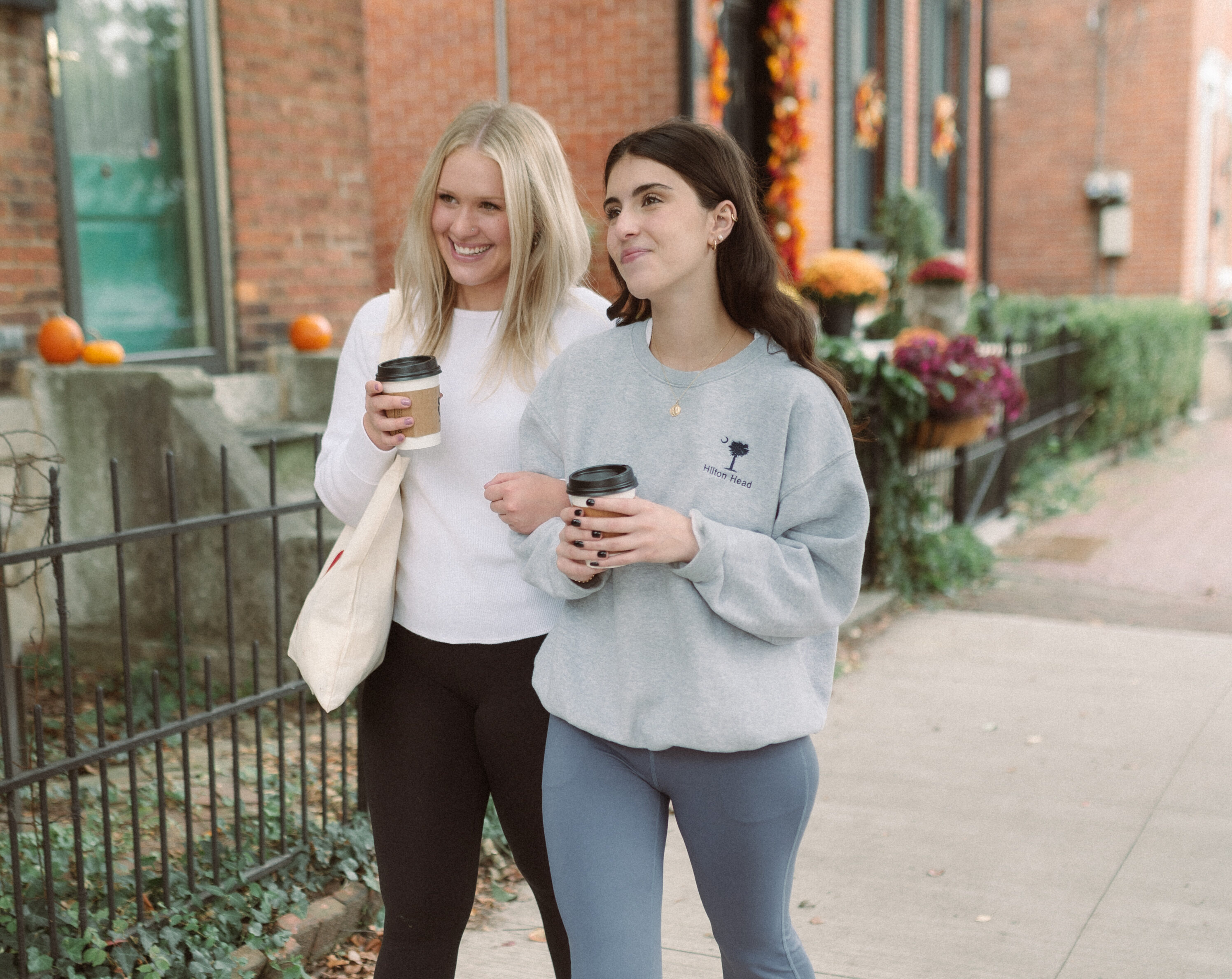 two girls walking in the german village near OSU