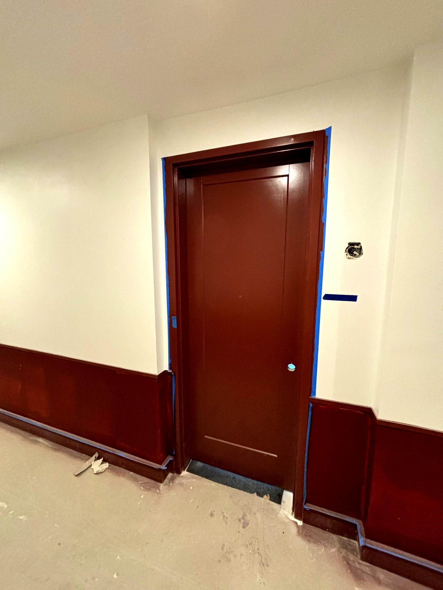 Rambler Columbus residential hallways with painting and trim underway. 