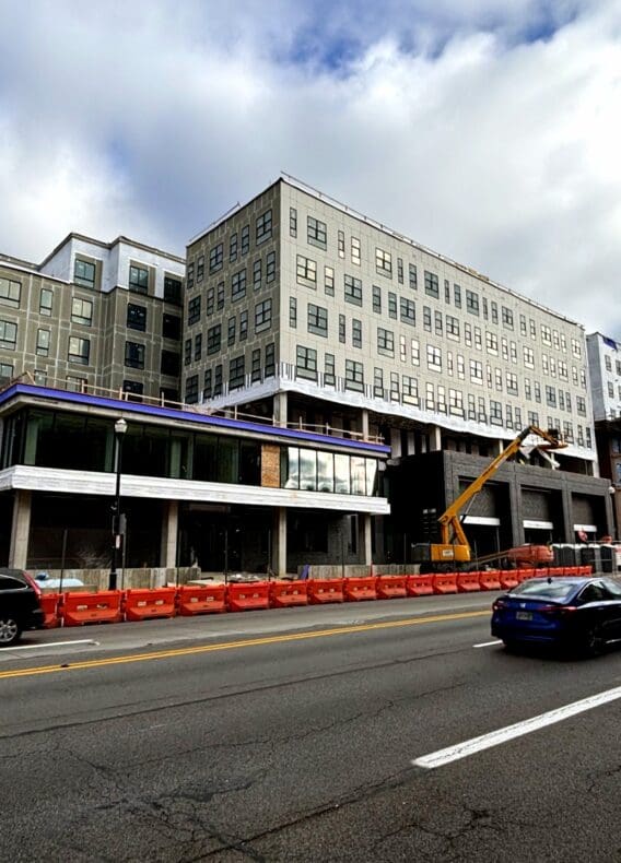 View of Rambler Columbus main entry and pool deck from southwest corner.